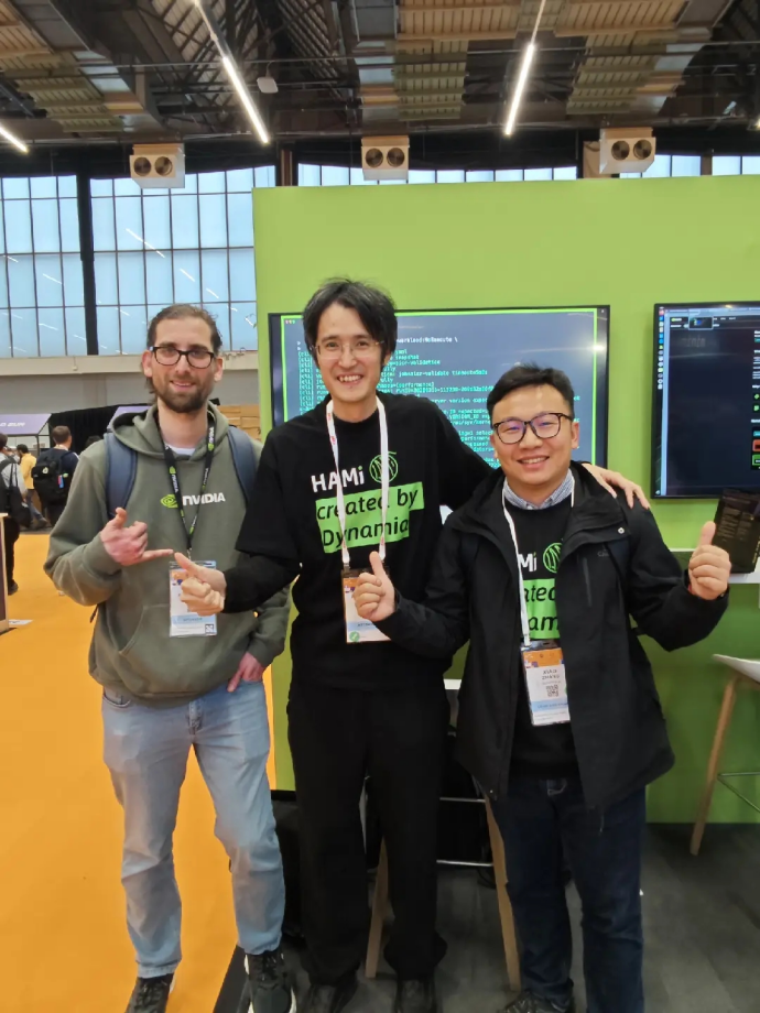 Run:ai Senior Software Engineer (left), Mengxuan Li, Co-founder & CTO of Dynamia (center), and Xiao Zhang, Founder & CEO of Dynamia (right), at KubeCon Europe 2026